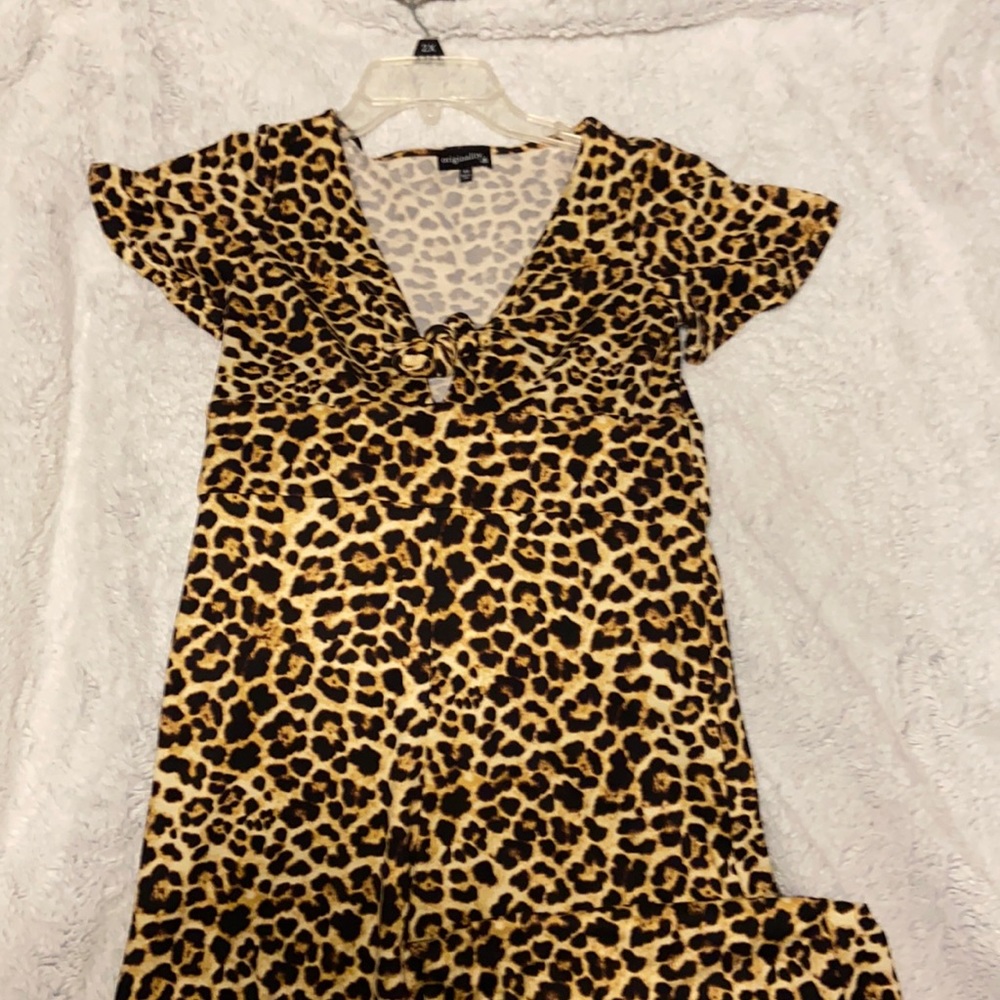 Cheetah Romper Never Worn size XS